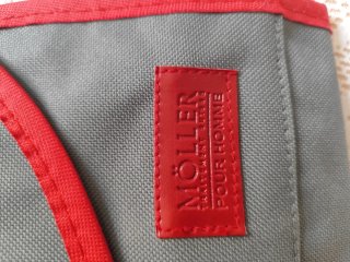 Neceser colgante Möller gris y rojo