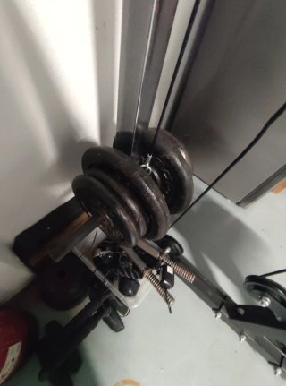 Máquina polea alta y baja + discos pesas