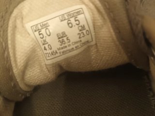 Zapatillas Vans grises y blancas