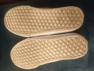 Zapatillas Vans grises y blancas
