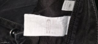 Pantalones vaqueros grises con cremallera