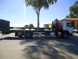 Volvo FM 12.380-CAMIONES PORTAMAQUINARIAS