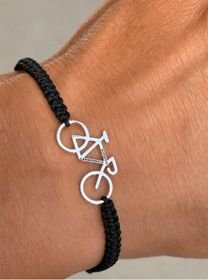Pulsera bicicleta plata ley macramé.