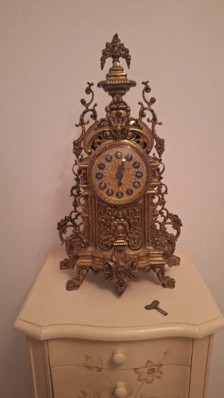 Conjunto reloj y 2 candelabros bronce