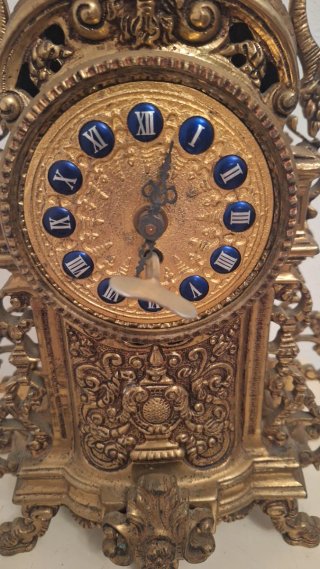 Conjunto reloj y 2 candelabros bronce