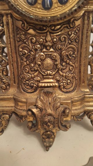 Conjunto reloj y 2 candelabros bronce