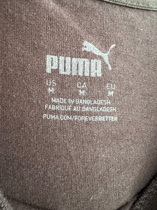 Camiseta Puma Negra y Dorada