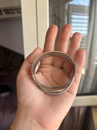 Bracciale rigido acciaio inox effetto intrecciato