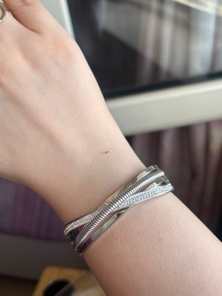 Bracciale rigido acciaio inox effetto intrecciato