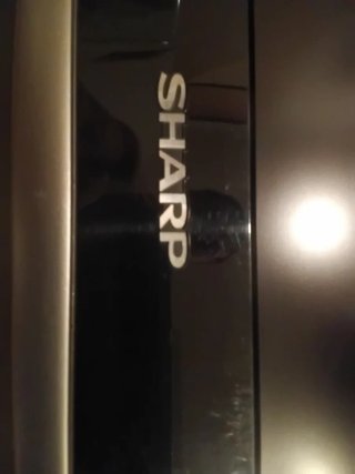 Televisor y mando Sharp 32 sin peana con mando