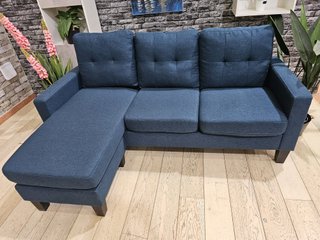 Sofá de 3 plazas azul con puff