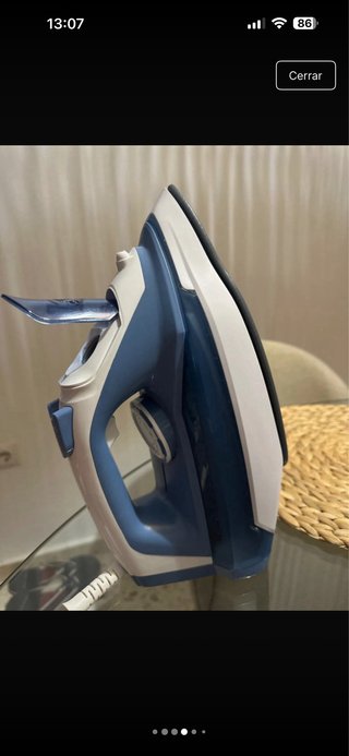 Plancha de vapor azul y blanca