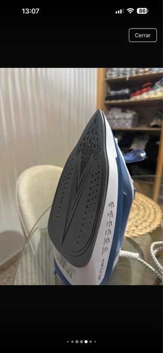 Plancha de vapor azul y blanca