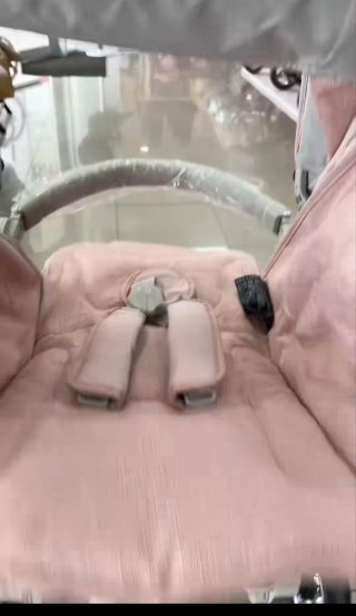 Carrito de bebé rosa