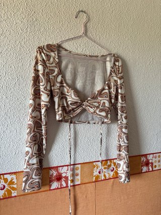 Top manga larga estampado