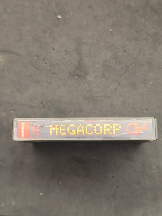Amstrad CPC Mega-Corp Cassette Game