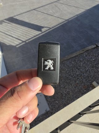 Llave con mando Peugeot