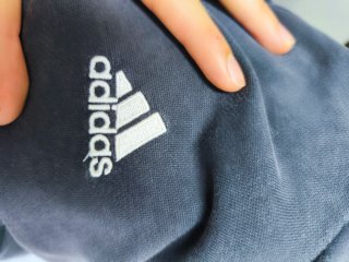 Dos sudaderas Adidas y puma