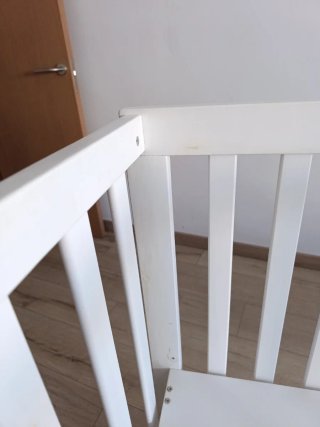 Cuna de madera con altura regulable