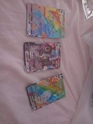 Carte Pokémon VMAX Charizard Umbreon Rayquaza