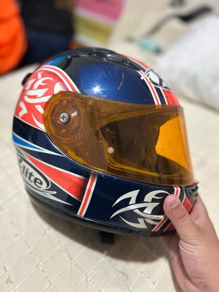 Casco de moto X-lite naranja y azul