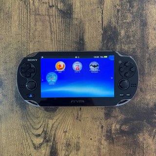 PS Vita 1004 OLED Negra COMO NUEVA.