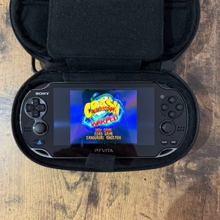PS Vita 1004 OLED Negra COMO NUEVA.