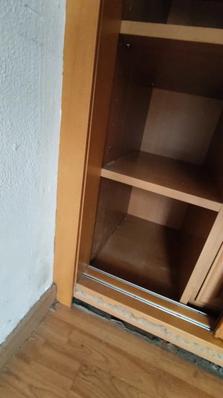 Armario a medida de madera vestido con cajones