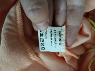 Vestido naranja con encaje y lazo