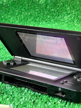 Nintendo DS Lite in nero, in buone condizioni e funzionante
