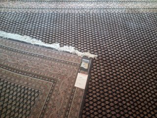 Alfombra salón negra y marrón