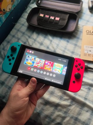 Nintendo Switch + Accesorios y Juegos