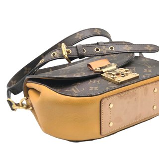 Bolso Louis Vuitton Eden Marrón y Dorado