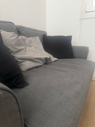 Sofá cama de tela gris