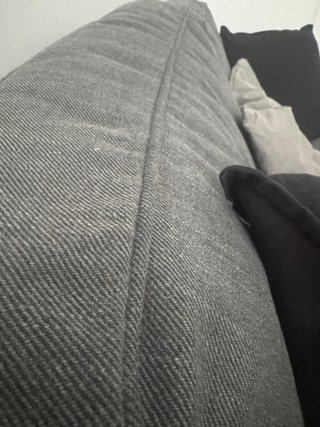 Sofá cama de tela gris