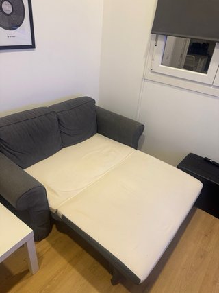 Sofá cama de tela gris