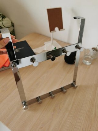 Colgador de toallas metálico para puerta