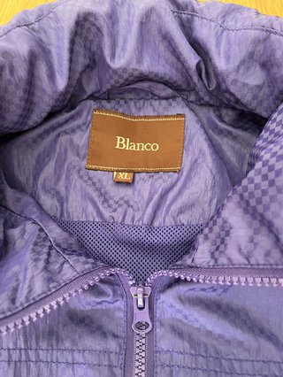 Chaqueta impermeable morada
