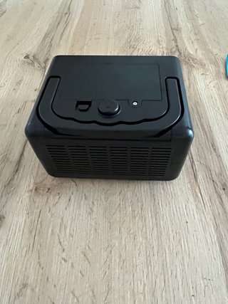 Máquina de burbujas portátil con líquido