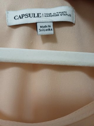Blusa elegante color albicocca