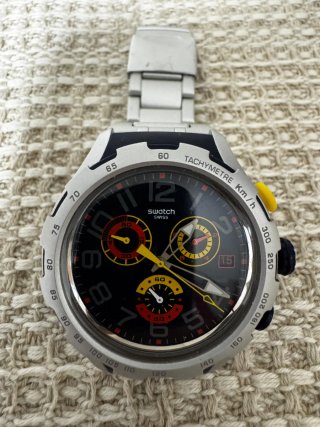 Reloj Swatch Negro y Plateado