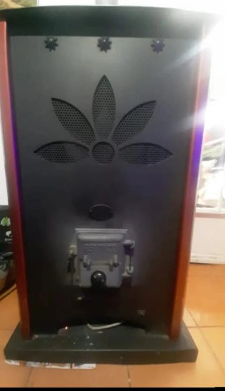 Estufa leña hueso aceituna.