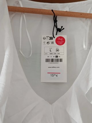 Blusa blanca volantes talla L