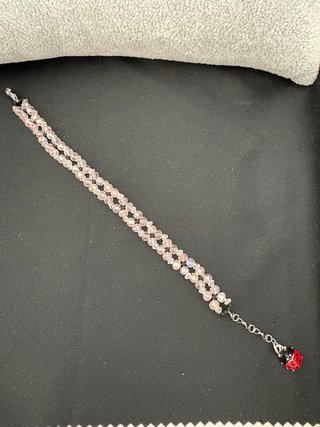 Braccialetto donna con perline rosa e nere