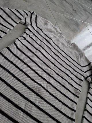 Malha de inverno feminina às riscas