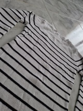 Malha de inverno feminina às riscas