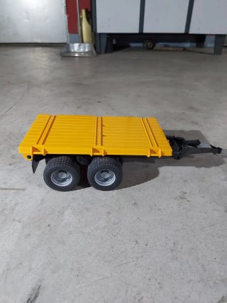 Remolque plano amarillo
