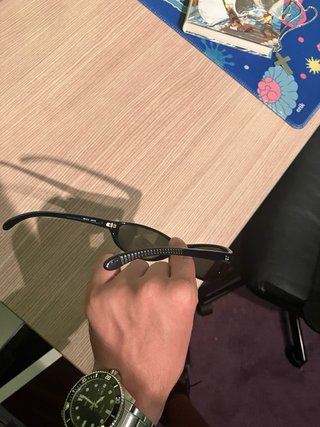 Gafas de sol Ray-Ban negras y azules