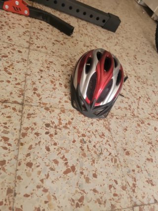 Bicicleta Orbea con casco y cojín