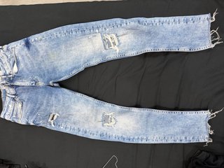 Pantalones vaqueros desgastados
